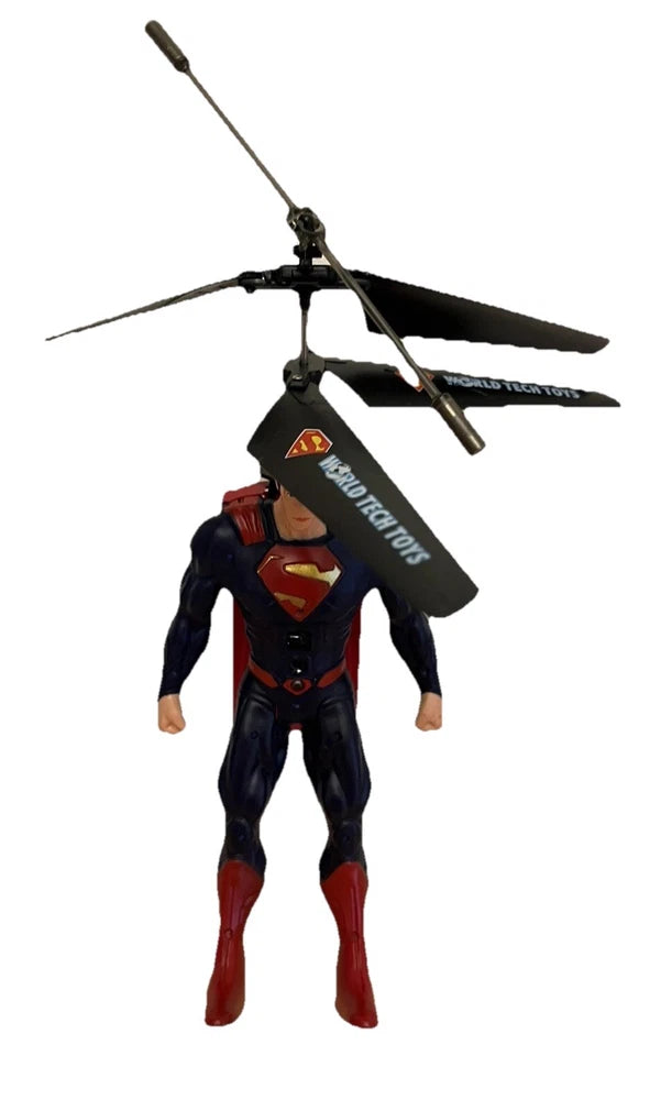 Superman action figure with black RC helicopter and rotor blades