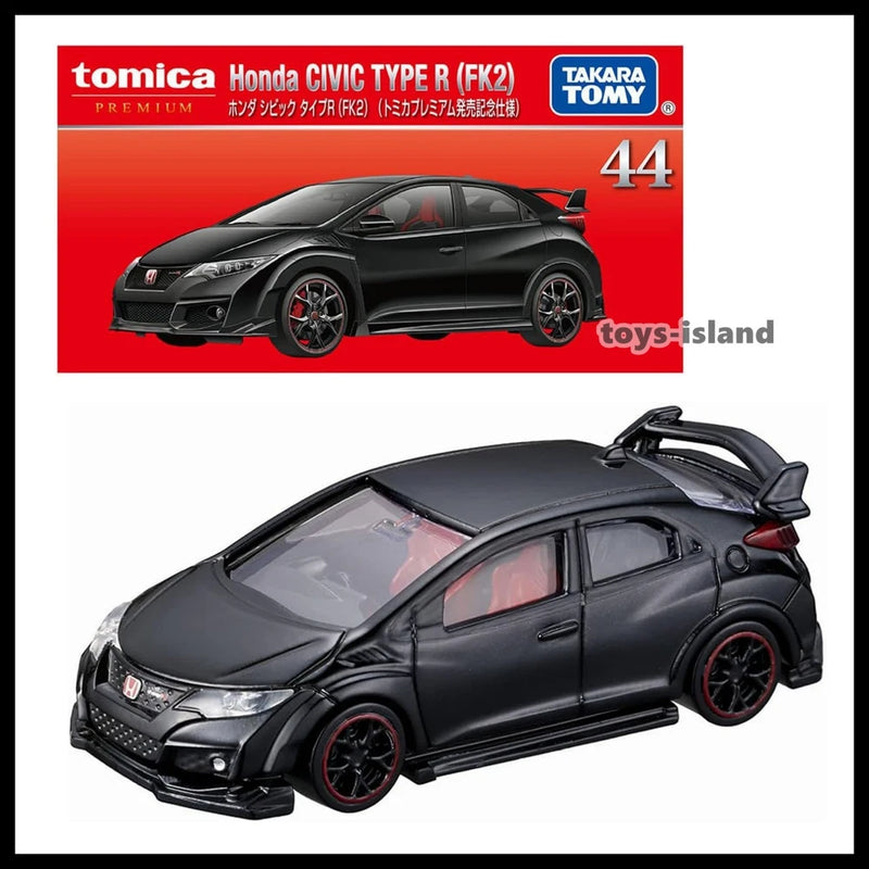 Black die-cast model car with rear spoiler, red-accent wheels