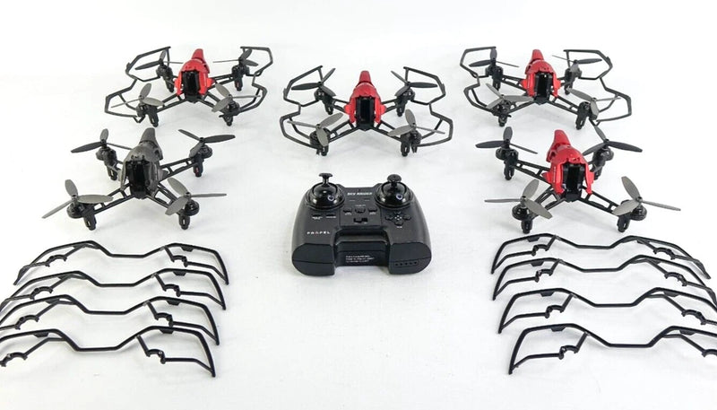 RC toy drone kit with multiple quadcopter frames, remote controller, and prop guards