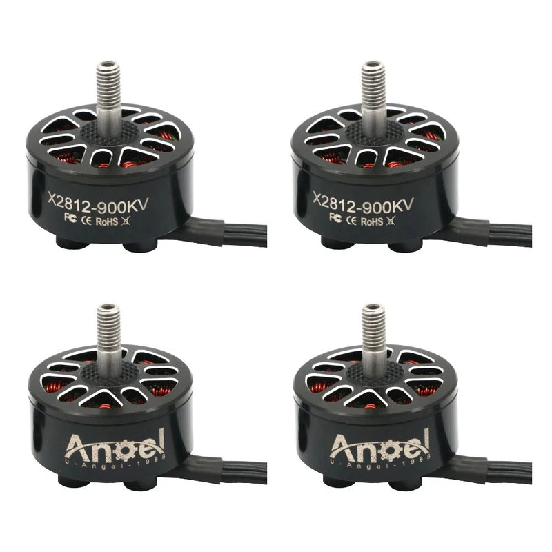 Set of four brushless RC drone motors, black housings, silver shafts, red wiring