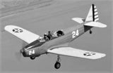 Low-wing RC airplane model with white wings and dark-gray fuselage, prop nose