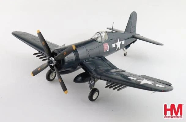 F4U Corsair model aircraft in dark gray with US markings, landing gear down
