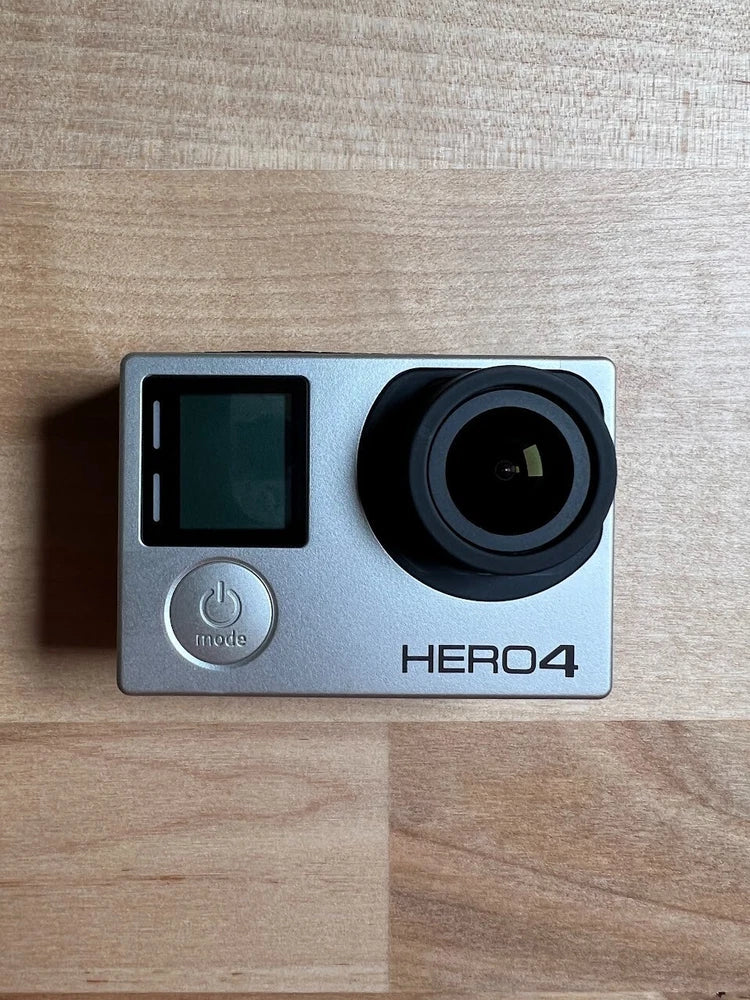 GoPro HERO4 action camera front view with LCD screen and circular lens