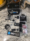 GoPro HERO3 action camera kit with black camera, mounts, case, cables, battery