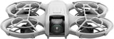 Compact quadcopter drone with white frame and front camera, four propeller arms