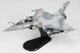 Gray jet aircraft model with cockpit detail on black display stand