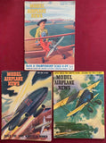 Vintage model airplane news magazines with illustrated aircraft covers