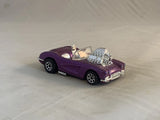 Purple 1958 Corvette-style die-cast coupe toy car with chrome details