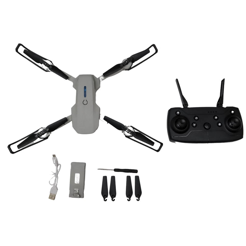 Gray quadcopter RC drone with 4 propellers and black controller with two antennas