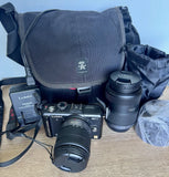 PANASONIC LUMIX DMC-GF1. INCLUDES 2 LENSES, CHARGER, BATTERY, BAG, MEMORY CARD