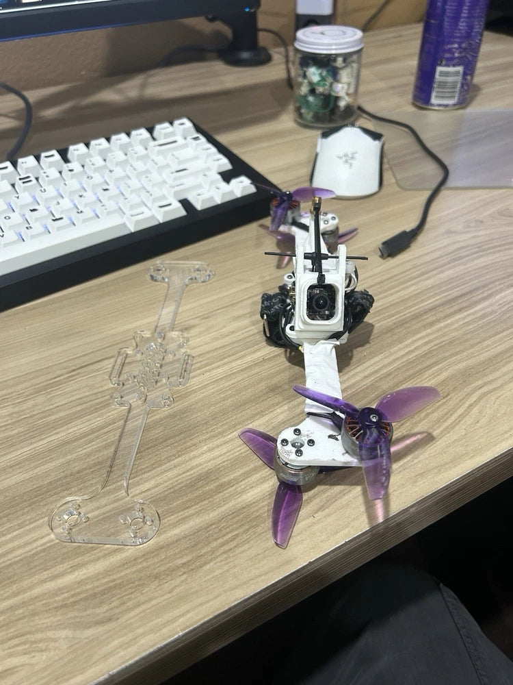 FPV bone drone full assembly with white frame and purple propellers