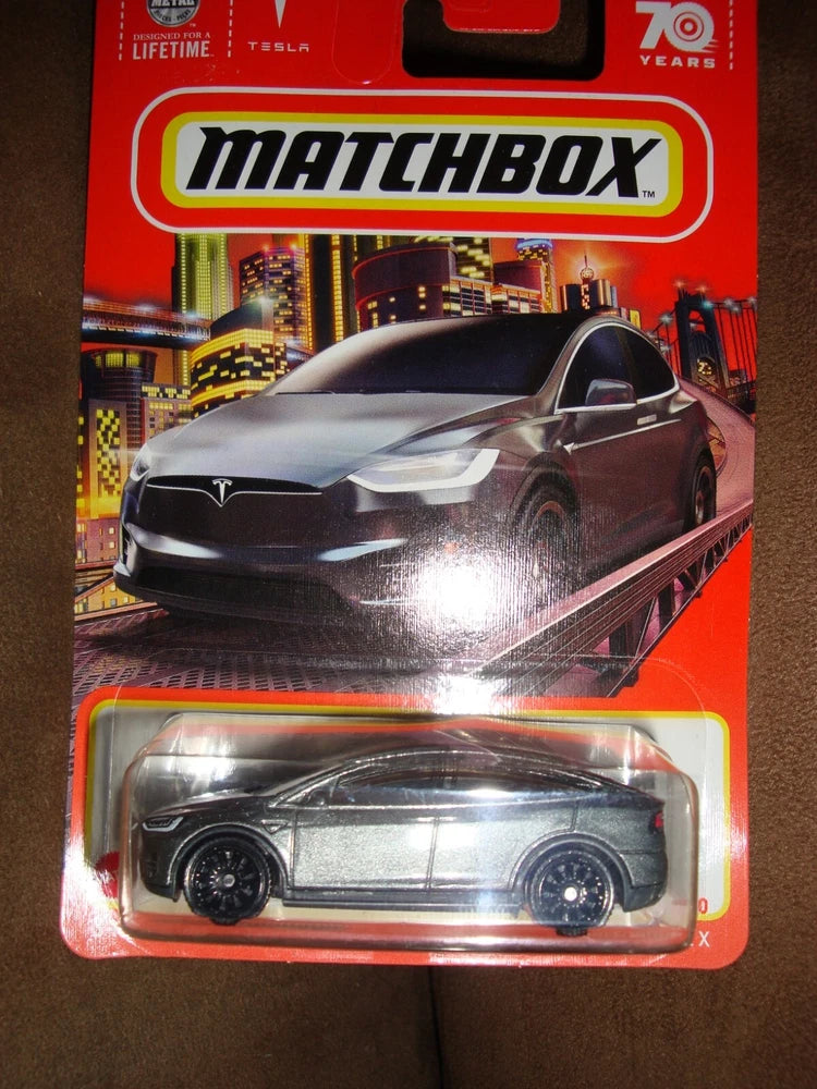 Gray Tesla Model X die-cast toy car in Matchbox blister pack
