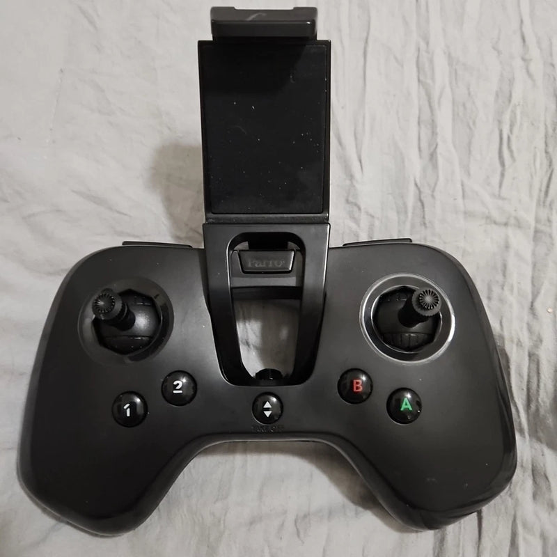 Black drone controller with phone holder and two thumbsticks