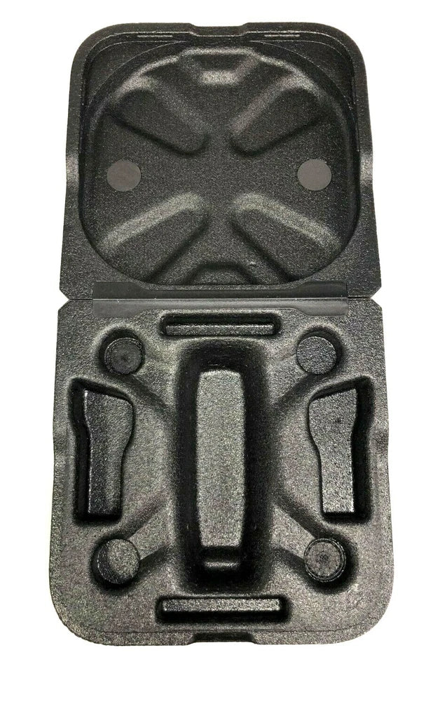 Black protective foam cutout insert with central drone-shaped cavity