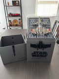 Star Wars T-65 X-Wing battling drone in open box with aircraft model inside