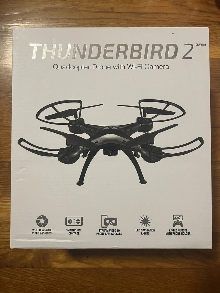 WiFi camera quadcopter drone illustration on product box, black body with four rotors