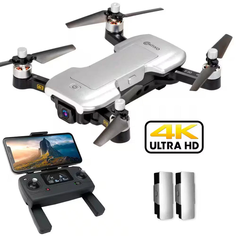 White quadcopter drone with 4K Ultra HD camera, plus black remote controller and phone mount