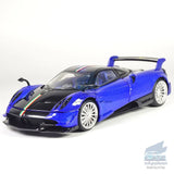 Blue 1:32 Pagani Huayra Roadster BC diecast model car with black accents, front-left view