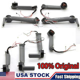 Grey drone arm cover shells with motors and wiring harnesses, front and rear set