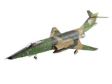 Camouflaged green and tan jet scale model with landing gear, side view