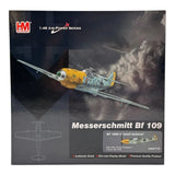 Die-cast Messerschmitt Bf 109 model in retail box with yellow aircraft illustration
