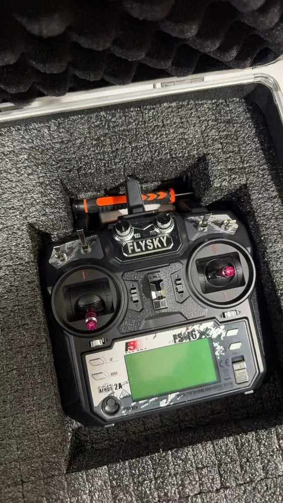 Drone remote control with LCD screen and butterfly LED control buttons, in case