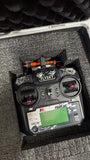 Drone remote control with LCD screen and butterfly LED control buttons, in case