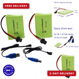 Two green LiPo rechargeable RC batteries with red/black wires and connector plugs