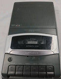 Optimus portable cassette recorder with STOP/PLAY/REW/FAST controls and speaker grille