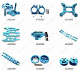 Blue aluminum RC upgrade parts set with arms, plates, and hub components for 1:10