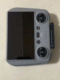 DJI RC2 controller with dark screen, dual top knobs and side handle, gray casing