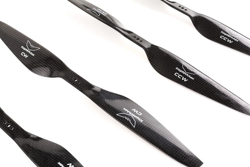 Black carbon fiber drone propellers, CW markings, glossy weave finish