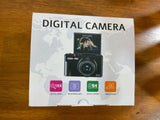 Black 4K digital camera package with front camera and lens graphic