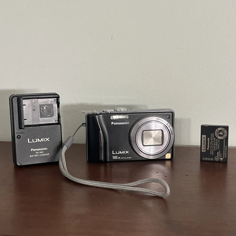 Panasonic Lumix DMC-ZS8 Camera, Battery & DE-A65 Charger, Leica Lens