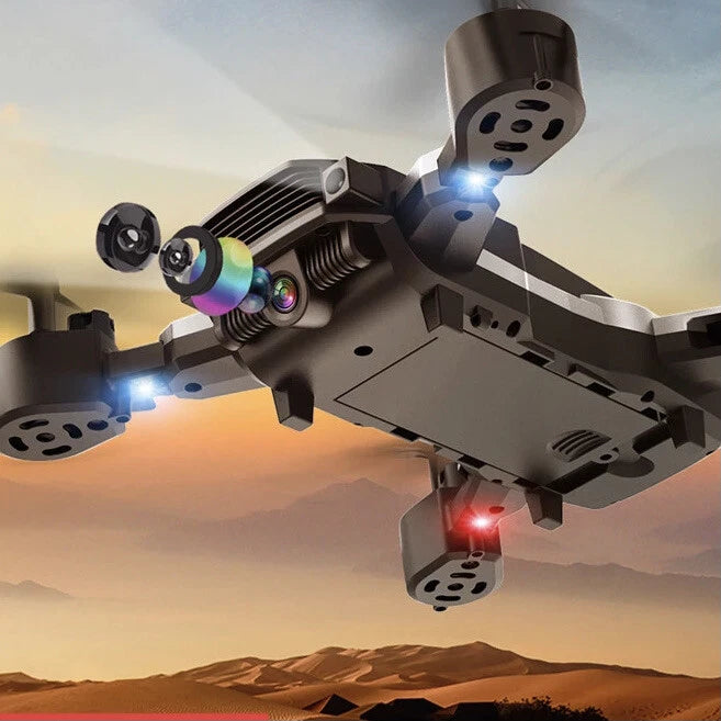 Foldable quadcopter drone with front dual cameras and blue/red status lights, gray