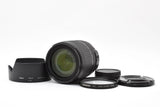 Nikon AF-S 18-105mm zoom lens with hood, front cap, and rear cap