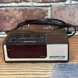 Vintage Spartus alarm clock with red LED display and faux woodgrain base