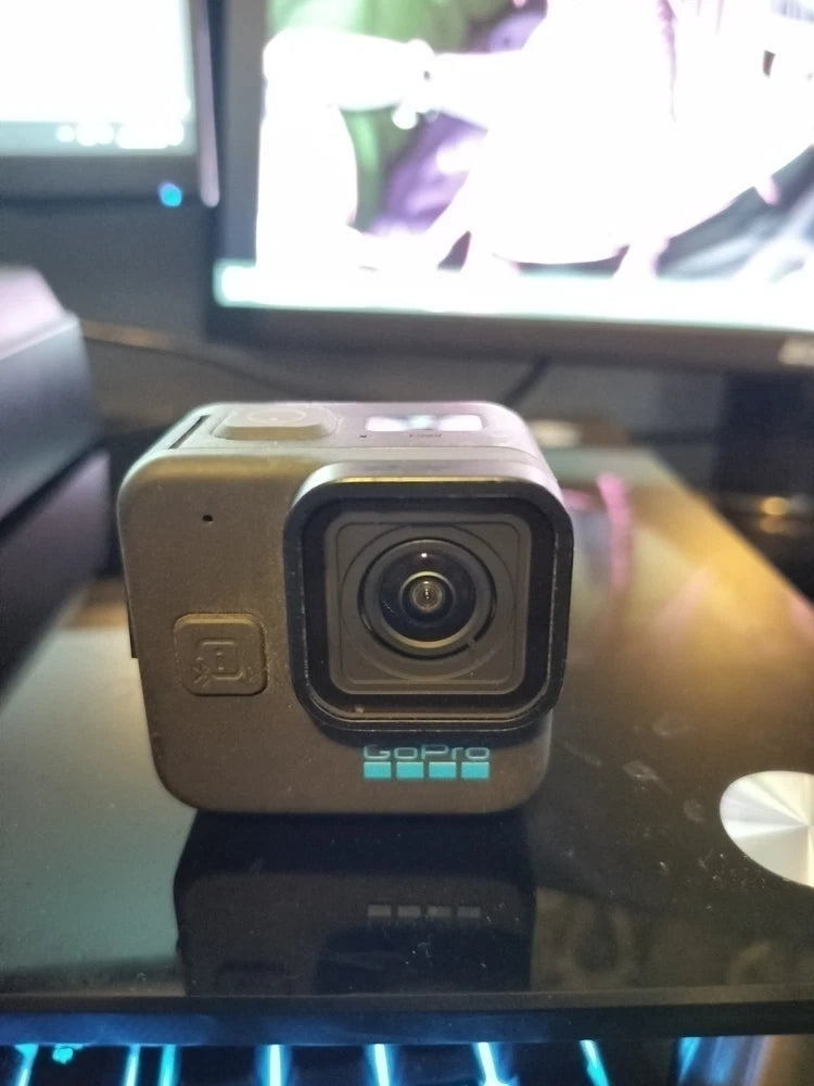 GoPro HERO11 Black mini waterproof action camera showing front lens and buttons