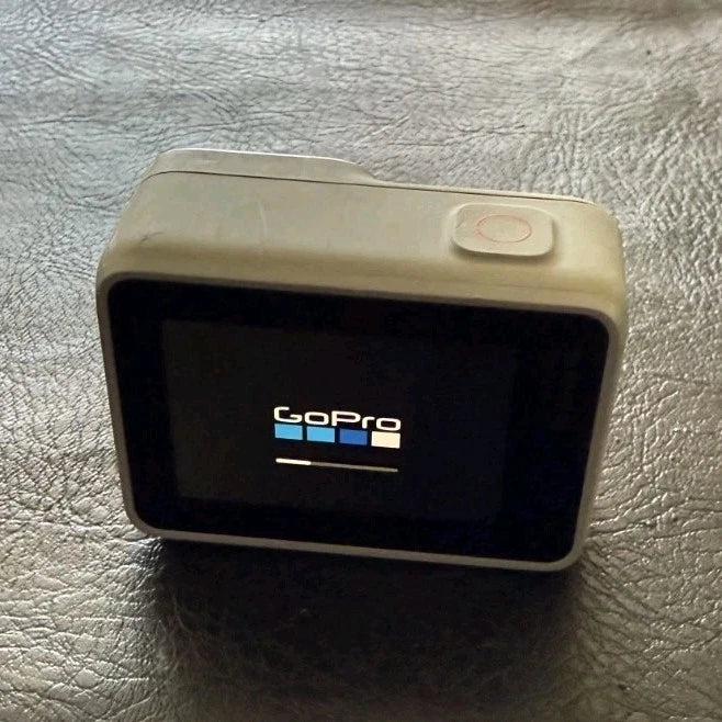GoPro HERO7 gray waterproof action camera, front screen with GoPro logo