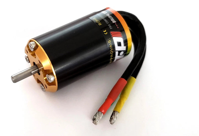 Brushless RC motor with black cylinder, gold end cap, metal shaft, and red/green wires