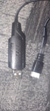 Black USB battery charger adapter with charging cable and connector ends