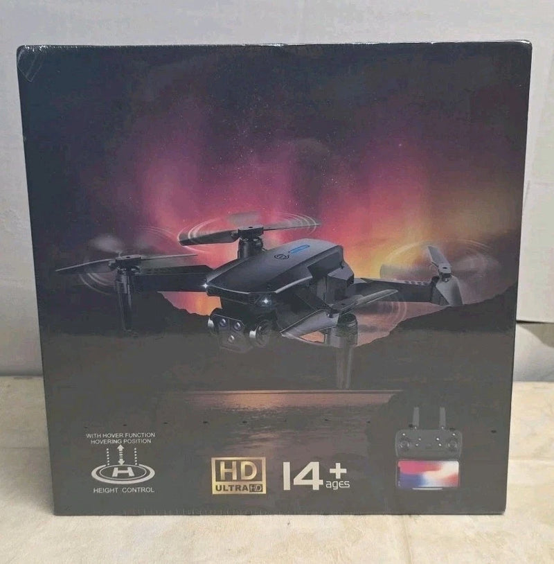 Black RC quadcopter drone with HD camera and remote controller, product box front