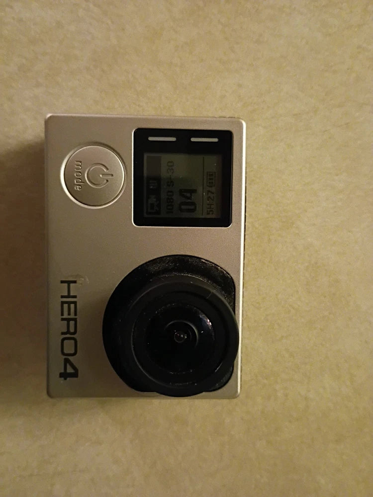 GoPro HERO4 Silver action camera with front lens and small LCD display