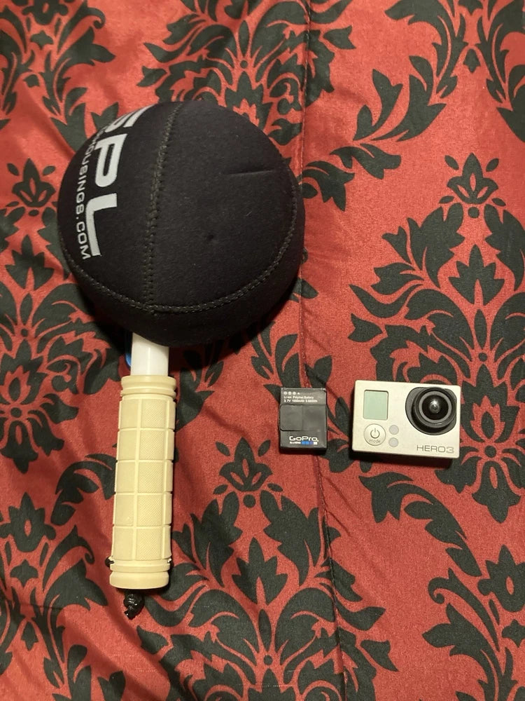 Black GoPro HERO3 action camera with battery pack and protective pouch