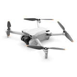 DJI Mini 3 camera drone, white quadcopter with 3-axis gimbal and four propellers