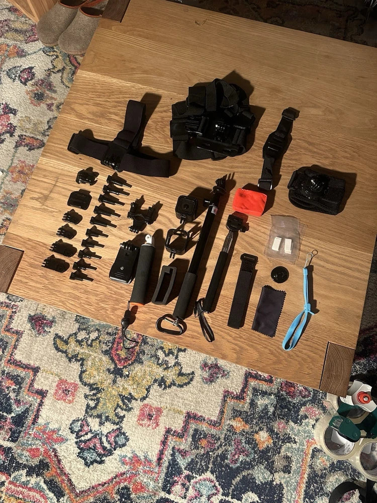 GoPro HERO Session action camera accessory kit with mounts, straps, housing and base pieces