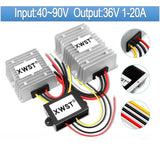 DC-DC buck converter module with aluminum heatsinks and red/black/yellow wires