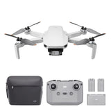 Foldable ultralight drone with controller, extra batteries, and carrying case.