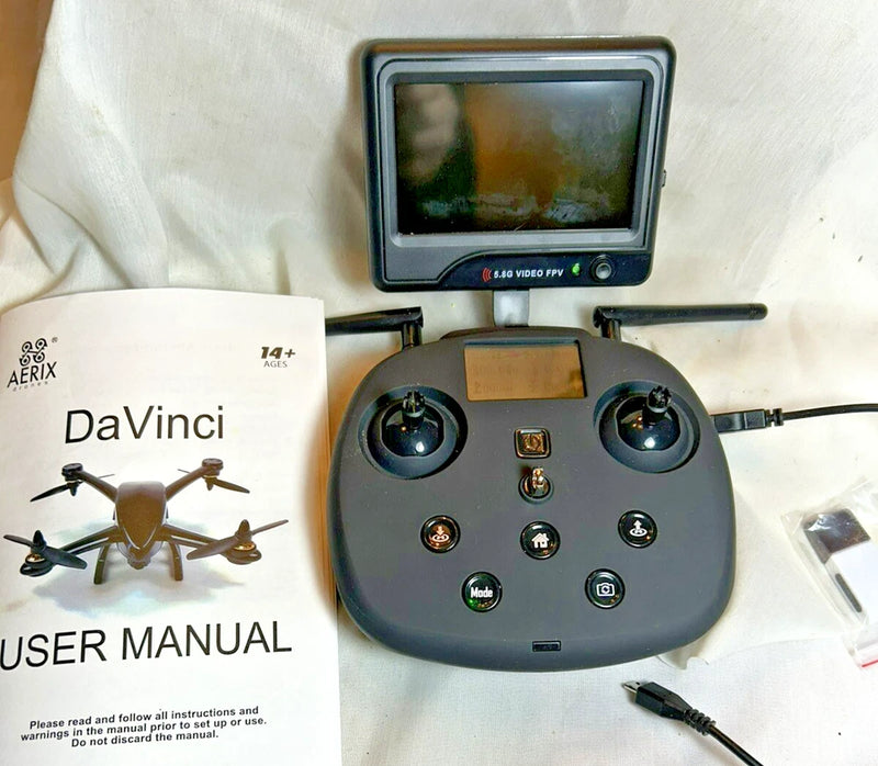 Drone remote control with LCD screen, two joysticks, and multiple control buttons
