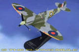 Green Spitfire Mk V model airplane with roundels on stand, 1:48 scale